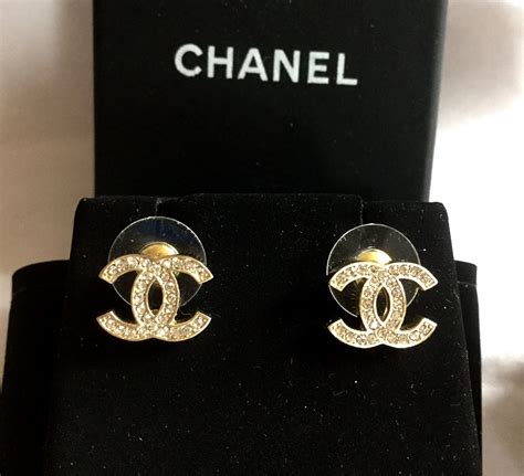 gold chanel floral stud earrings|authentic Chanel logo stud earrings.